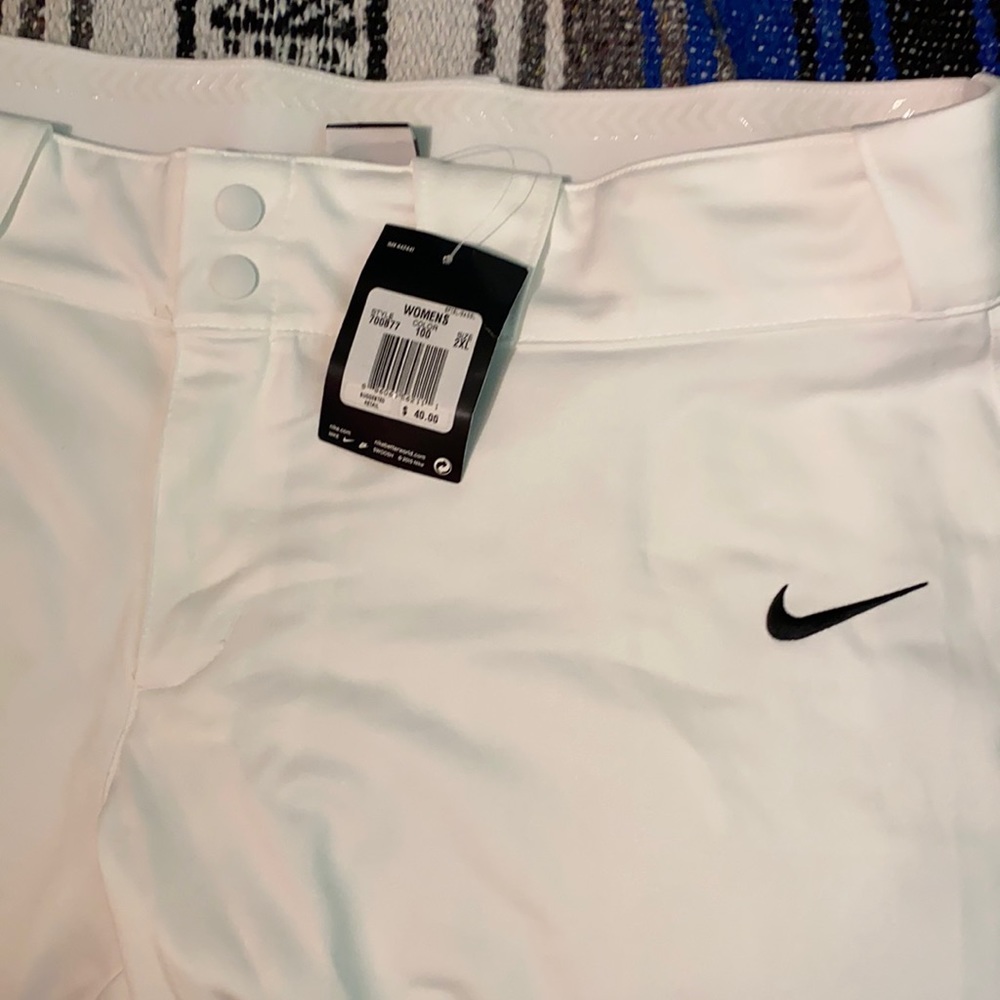 White Nike softball pants